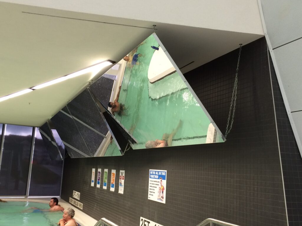 Clareview Community Recreation Aquatic Facility - Overhead Hanging Glassless Mirrors