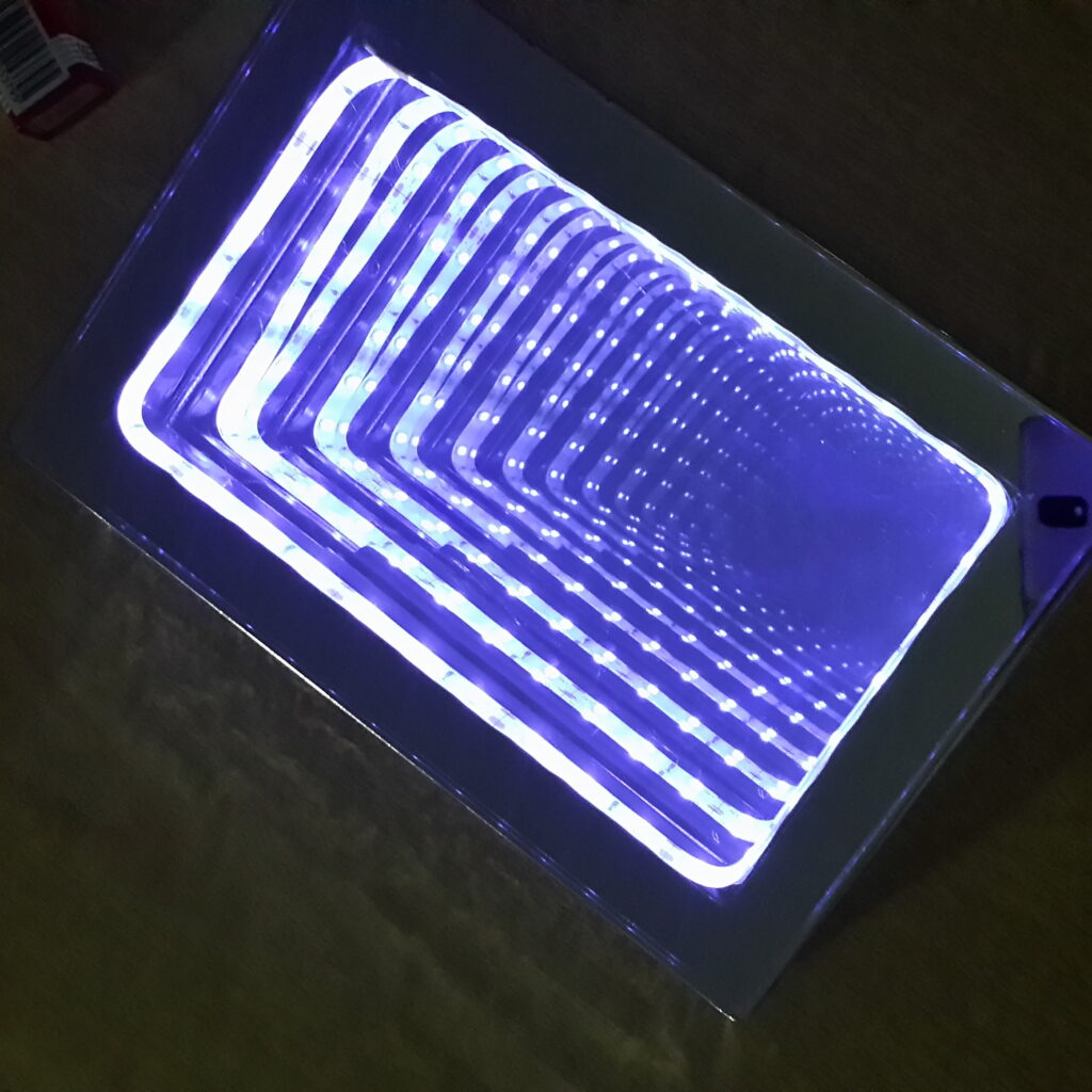 Scrim See-Thru Glassless Mirror