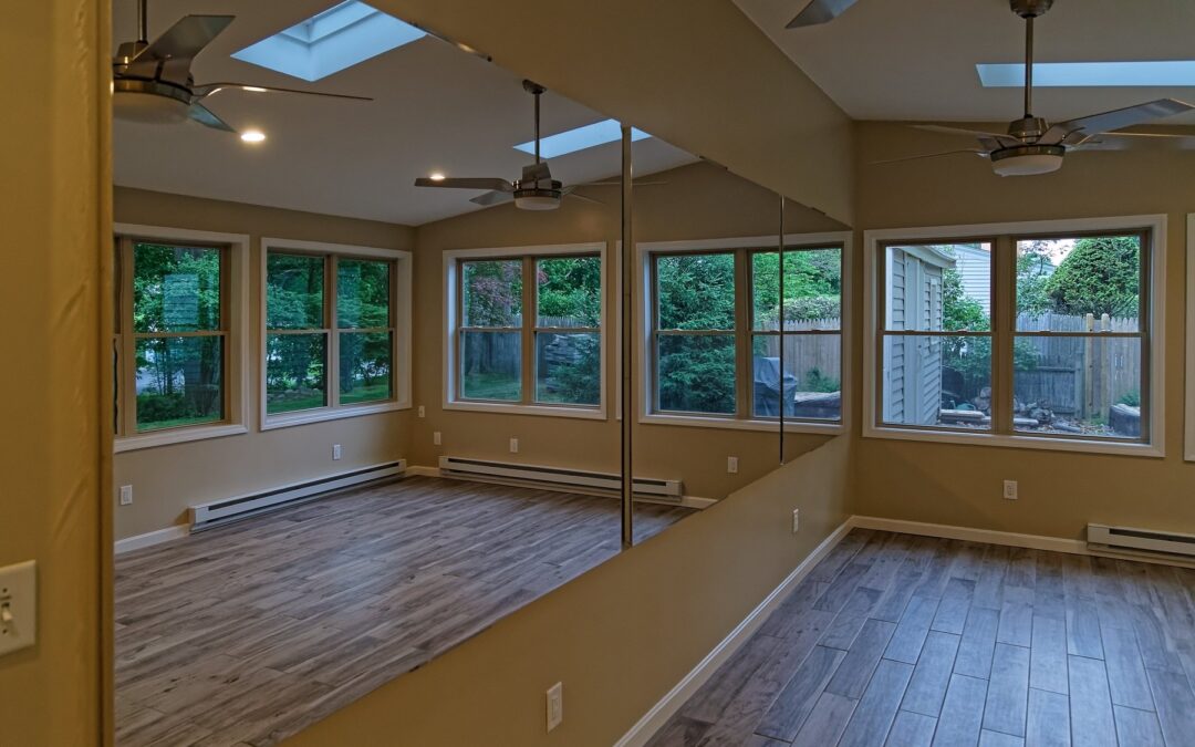 Wall mounted glassless mirrors installed in a professional dance studio